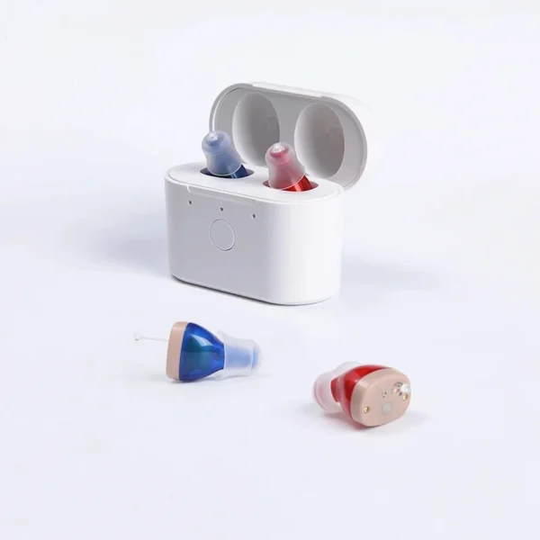 The C420 hearing aid in red and blue is placed on the table