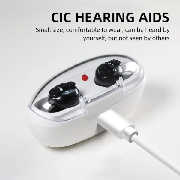 The GM-916 hearing aid is plugged into the charging cable