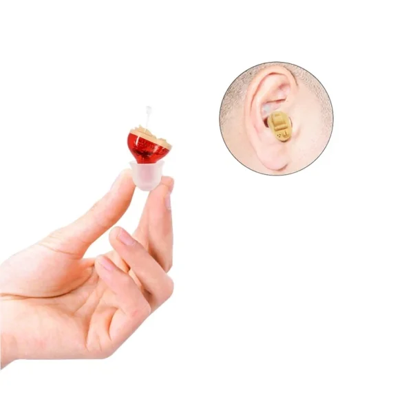 The red GM-910 hearing aid on my hand